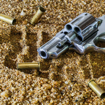Gun and bullets crime scene